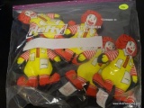 (R3) BAG LOT OF MINIATURE PLUSH RONALD MCDONALD TOYS. APPROXIMATELY 5 TOTAL. ITEM IS SOLD AS IS