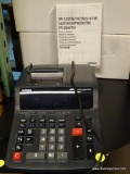 (R3) CASIO CALCULATOR WITH MANUAL. MODEL FT-2650TM. ITEM IS SOLD AS IS WHERE IS WITH NO GUARANTEE OR