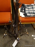 (R3) BRONZE TONE CHANDELIER. WITH TUBE STYLE LIGHT BULBS. ITEM IS SOLD AS IS WHERE IS WITH NO