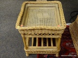 (R3) WICKER AND GLASS TOP END TABLE. MEASURES 19 IN X 21 IN X 20 IN. ITEM IS SOLD AS IS WHERE IS