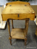 (R3) ANTIQUE LIFT-TOP DESK WITH COVERED COMPARTMENTS AND INTERIOR DRAWER. MEASURES 19 IN X 20 IN X