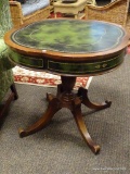 (R3) LEATHER TOP AND MAHOGANY TABLE WITH MAHOGANY DUNCAN PHYFE STYLE BASE. MEASURES 29 IN X 28 IN.