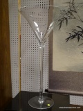 (R3) PAIR OF BADASH OVERSIZED CRYSTAL MARTINI GLASSES. BOTH MEASURE 14 IN X 27.5 IN. ITEM IS SOLD AS
