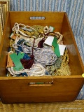 (R3) WOODEN CRATE CONTAINING ASSORTED TASSELS IN VARYING COLORS. MEASURES 15 IN X 20 IN X 9 IN. ITEM