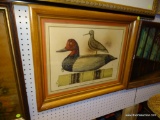 (R3) FRAMED DUCK DECOY PRINT IN A MAPLE FRAME. MEASURES 26 IN X 21 IN. ITEM IS SOLD AS IS WHERE IS