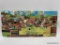 (2B) ONE OF A KIND COLLAGE ARTWORK DEPICTING A COUNTRY FAIR AUCTION SCENE - MEASURES 10.5