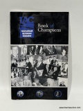 (4D) SIGNED IAC 25TH ANNIVERSARY INTERNATIONAL AUCTIONEERS CHAMPIONSHIP BOOK OF CHAMPIONS, MOST