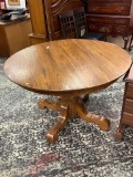 48 INCH ROUND SOLID OAK PEDESTAL DINING TABLE