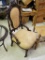 ANTIQUE VICTORIAN PARLOR CHAIR ON CASTERS - HEAVILY CARVED, GOLD UPHOLSTRY - SEAT SHOWS SOME WEAR