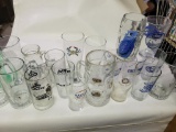 LARGE LOT OF BEER/BEVERAGE GLASSES INCLUDING PENN STATE, SAMUEL ADAMS, GERMAN ITEMS - AND MORE!