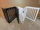 TWO WOODEN FOLDING DOG GATES - EACH MEASURES 24