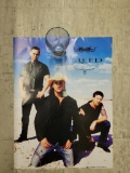 POSTER OF THE BAND CREED AND A LYNRD SKYNYRD BEVERAGE GLASS DEPICTING A GIRL IN A BIKINI