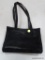 (BAY1 ENT) ROOTS HANDBAGS FOR WOMEN IN BLACK. SIMILAR ITEMS RETAIL FOR $70 ONLINE AT AMAZON. ITEM IS