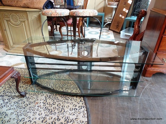 FRONT CENTER - COFFEE TABLE. BEAUTIFUL METAL AND GLASS TWO SHELF. APPROX 55 INCHES LONG AND 22