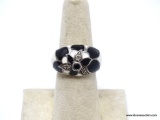 .925 STERLING SILVER FLORAL RING WITH BLACK BLACK ONYX & WHITE ENAMEL, CENTER BLACK ONYX STONE. SIZE
