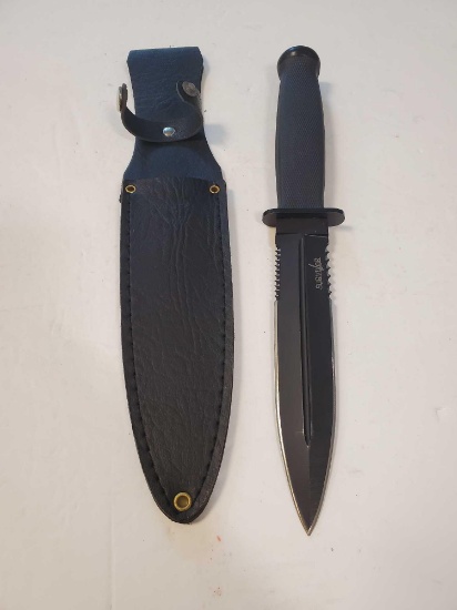Survivor double blade serrated back w/ Leather sheath. 6" blade, 11 1/4" total length.
