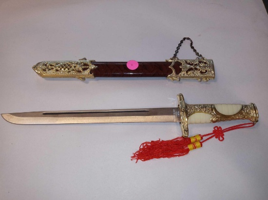 Oriental Style ceremonial hand dagger, with a white resin handle, and a metal scabbard, measurements