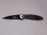 KERSHAW 1660OCC PATENTED APPROXIMATELY 7 INCHES LONG SPIDER DESIGN KNIFE.