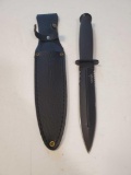 Survivor double blade serrated back w/ Leather sheath. 6