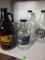 5 PIECE LOT. INCLUDES 4 GROWLERS AND ONE COPELAND'S GLASS MARGARITA CUP. IS SOLD AS IS WHERE IS WITH