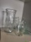 4 PIECE GLASS VASE LOT. IS SOLD AS IS WHERE IS WITH NO GUARANTEES OR WARRANTY, NO REFUNDS OR RETURNS