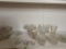 15 PIECE GLASS AND CRYSTAL SHELF LOT. TO INCLUDE A JUICER, CANDY DISHES, SALT CELLARS AND BOWL SETS.