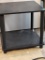 SMALL BLACK END TABLE. IS SOLD AS IS WHERE IS WITH NO GUARANTEES OR WARRANTY, NO REFUNDS OR RETURNS
