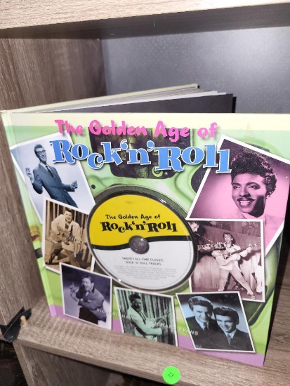 THE GOLDEN AGO OF ROCK N ROLL BOOK AND COMES WITH A BRAND NEW CD. INCLUDES SONGS FROM ELVIS PRESLEY,