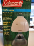 BRAND NEW COLEMAN OUTDOOR BATTERY OPERATED TABLE LAMP. IS SOLD AS IS WHERE IS WITH NO GUARANTEES OR