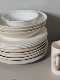 SHELF LOT. CREAM COLOR DISH SET TO INCLUDE VARIOUS BOWLS AND PLATES. VARUOIS BRANDS AND MATERIALS.