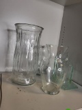 4 PIECE GLASS VASE LOT. IS SOLD AS IS WHERE IS WITH NO GUARANTEES OR WARRANTY, NO REFUNDS OR RETURNS