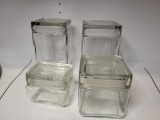 4 PIECE ANCHOR HOCKING GLASS CONTAINER SET WITH LIDS. IS SOLD AS IS WHERE IS WITH NO GUARANTEES OR