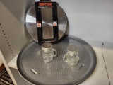 GLASS SKULL SALT AND PEPPER SHAKER, PIZZA BAKING DISH AND STAINLESS STEEL STOVE COVERS. IS SOLD AS