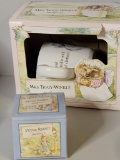 NEW PETER RABBIT BY WEDGEWOOD EGG CUP AND MRS. TIGGY-WINKLE BY WEDGEWOOD COFFEE MUG. IS SOLD AS IS