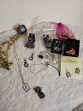 (SC) COSTUME JEWELRY LOT. INCLUDES SEVERAL EARRING AND NECKLACE COMBOS THAT ARE BRAND NEW. PAPARAZZI