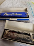 (SC) HARMONICA LOT. INCLUDES HANDCRAFTED PARROT 16 HOLD-C HARMONICA AND BLUESBAND HOHNER