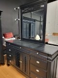 AMERICAN SIGNATURE BLACK SOLID WOOD 9 DRAWER W/ SHUTTER STYLE CABINET AND MIRROR DRESSER. HAS NICKEL