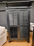 AMERICAN SIGNATURE BLACK SOLID WOOD ARMOIRE PLANTATION COVE. SHUTTER STYLE DOORS AND 2 INSIDE