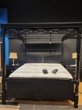 AMERICAN SIGNATURE BLACK SOLID WOOD KING SIZE CANOPY BED. CANOPY CAN BE REMOVED AND TURNED INTO A