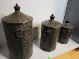LOT OF 3 METAL CANISTERS. THE TALLEST MEASURES APPROX. 16 IN H, NEXT ONE IS 12 IN HIGH AND SMALLEST