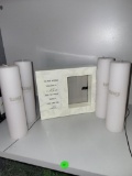4 BRAND NEW TALL TAG CANDLES AND A HEAVY DUTY MOTHER PICTURE FRAME 3.75IN X 5IN. IS SOLD AS IS WHERE