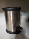 SMALL TRASH CAN WITH FOOT PEDAL TO LIFT LID. IS SOLD AS IS WHERE IS WITH NO GUARANTEES OR WARRANTY,