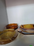 LOT OF 3 AMBER COLORED ASHTRAYS. IS SOLD AS IS WHERE IS WITH NO GUARANTEES OR WARRANTY, NO REFUNDS