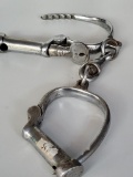 IRON HANDCUFFS WITH SCREW KEY SPF 259. IS SOLD AS IS WHERE IS WITH NO GUARANTEES OR WARRANTY, NO