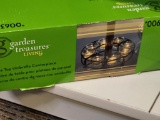 BRAND NEW GARDEN TREASURES LIVING TABLE TOP UMBRELLA CENTERPIECE. IS SOLD AS IS WHERE IS WITH NO
