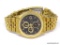 CITIZEN GOLD TONE QUARTZ CHRONOGRAPH WRIST WATCH. BLACK FACE WITH GOLD TRIM. JAPAN MOVEMENT.