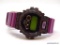 CASIO G-SHOCK WRIST WATCH, MODEL #DW-6900 - PURPLE AND BLACK WITH PURPLE CRYSTAL ACCENTS. 20 BAR