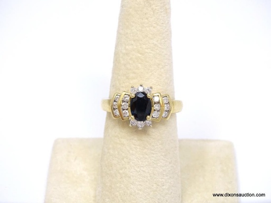 14K YELLOW GOLD SAPPHIRE AND DIAMOND RING. CENTER PRONG SET OVAL CUT SAPPHIRE GEMSTONE, WHICH