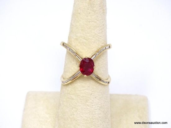 14K YELLOW GOLD RUBY AND DIAMOND X RING. CENTER OVAL CUT PRONG SET 1.03 CARAT RUBY GEMSTONE, WHICH