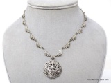 VINTAGE STERLING SILVER MARCASITE NECKLACE. ROUND FILIGREE STERLING PENDANT HANGING FROM FLORAL